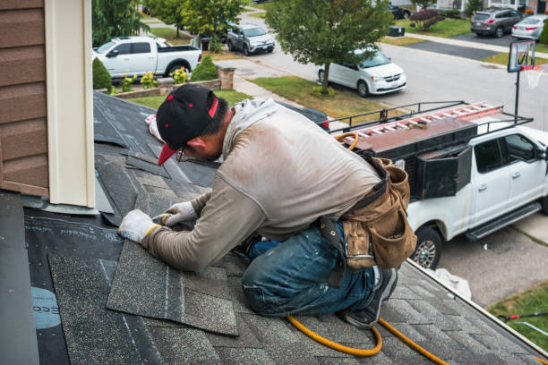 Professional Roofing technician working in Arlington, MA